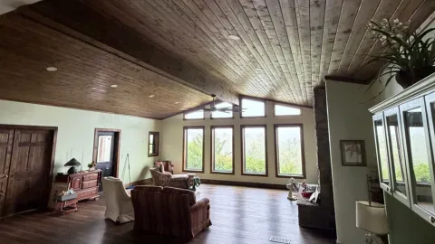 Living Room Addition: Vaulted Gable & Stone Fireplace