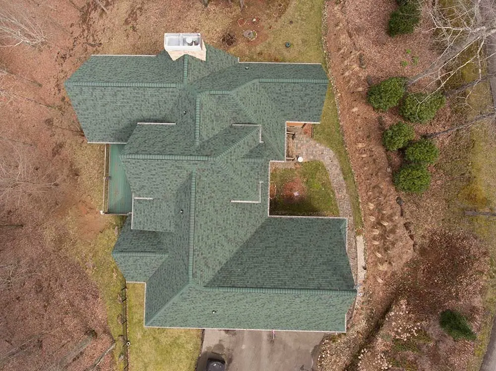 Multi-dormer dimensional shingle roof in the Little Tennessee valley near Otto, North Carolina