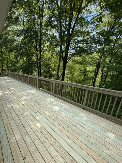 Deck & Railing Rebuild: Elevated Wooded Deck — view 1